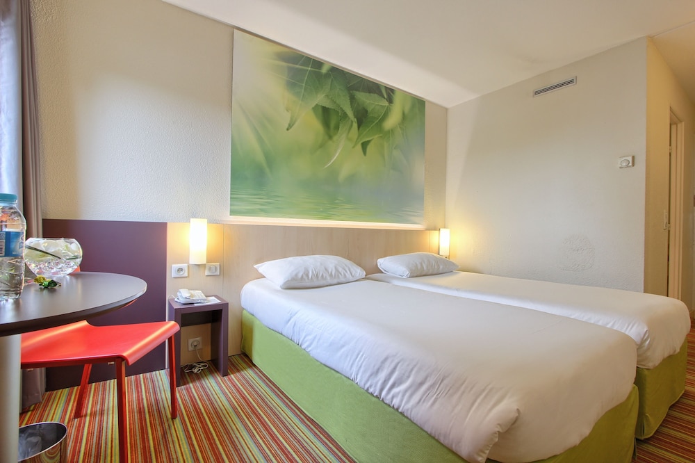 Habitación estándar, 2 camas individuales del hotel Ibis Styles Paris Roissy CDG. Foto 1