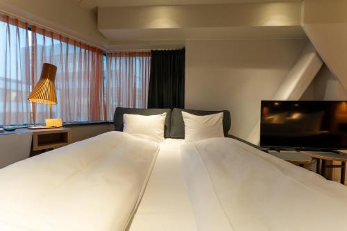 Habitación Familiar del hotel Clarion The Edge. Foto 3