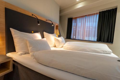 Habitación Familiar del hotel Clarion The Edge. Foto 4
