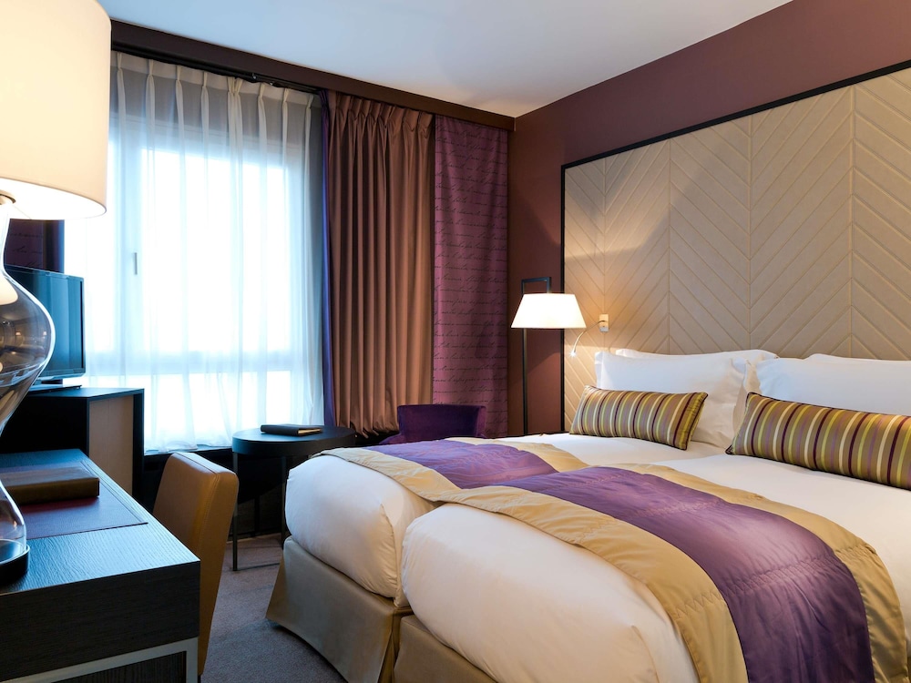 HABITACIÓN SUPERIOR con una cama king size o 2 camas individuales y vistas al jardín del hotel Sofitel Strasbourg Grande Ile. Foto 1