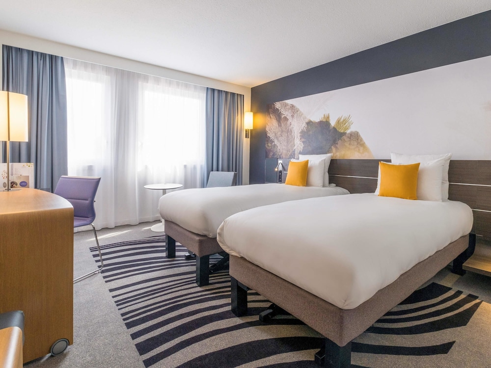 Habitación superior, 2 camas individuales del hotel Novotel Strasbourg Centre Halles. Foto 1