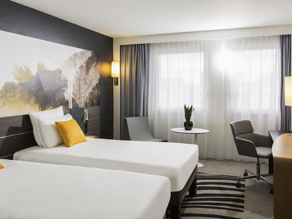 Habitación superior, 2 camas individuales del hotel Novotel Strasbourg Centre Halles. Foto 3