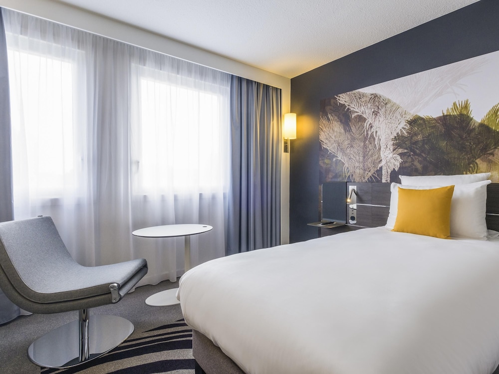 Habitación superior, 2 camas individuales del hotel Novotel Strasbourg Centre Halles. Foto 7
