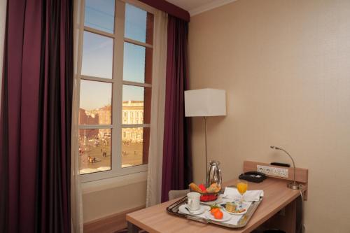 Habitación Familiar del hotel Plaza Hotel Capitole Toulouse. Foto 2