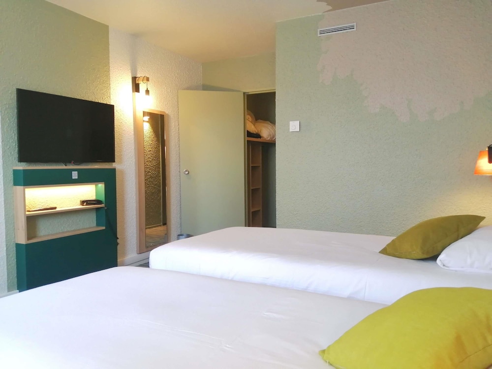 Habitación estándar con 2 camas individuales del hotel Ibis Styles Tours Sud. Foto 4