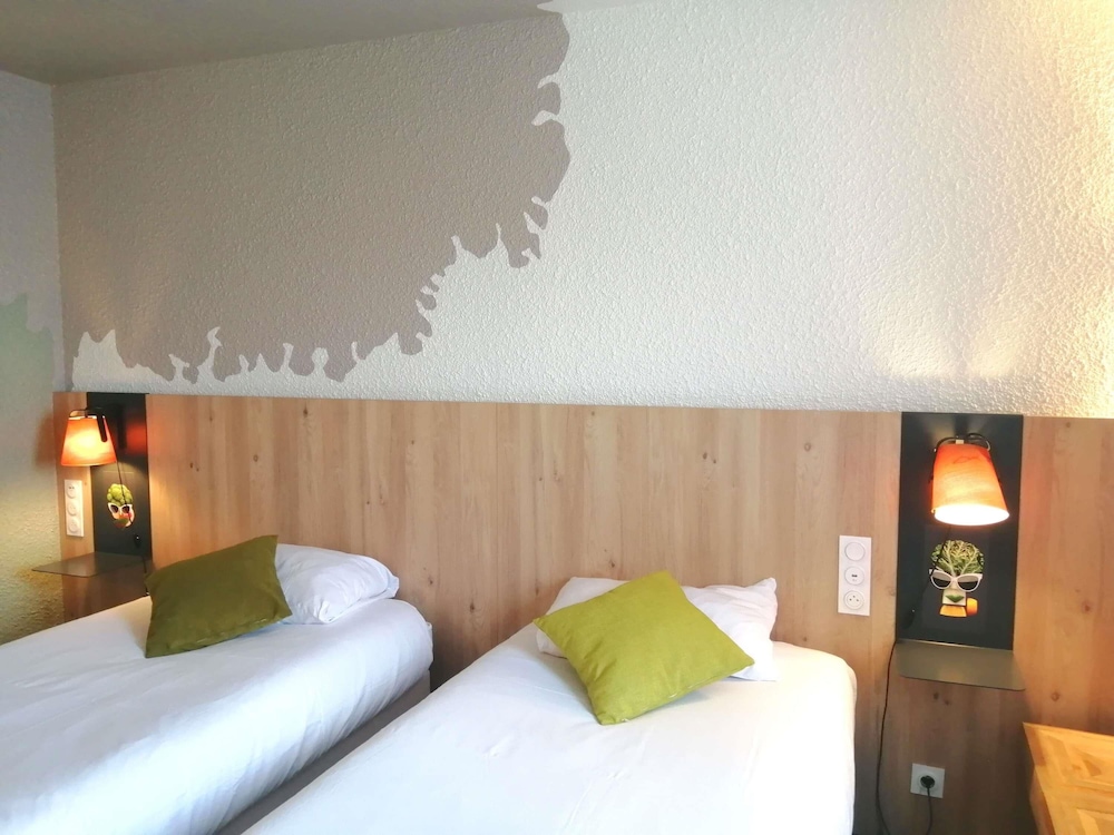 Habitación estándar con 2 camas individuales del hotel Ibis Styles Tours Sud. Foto 5