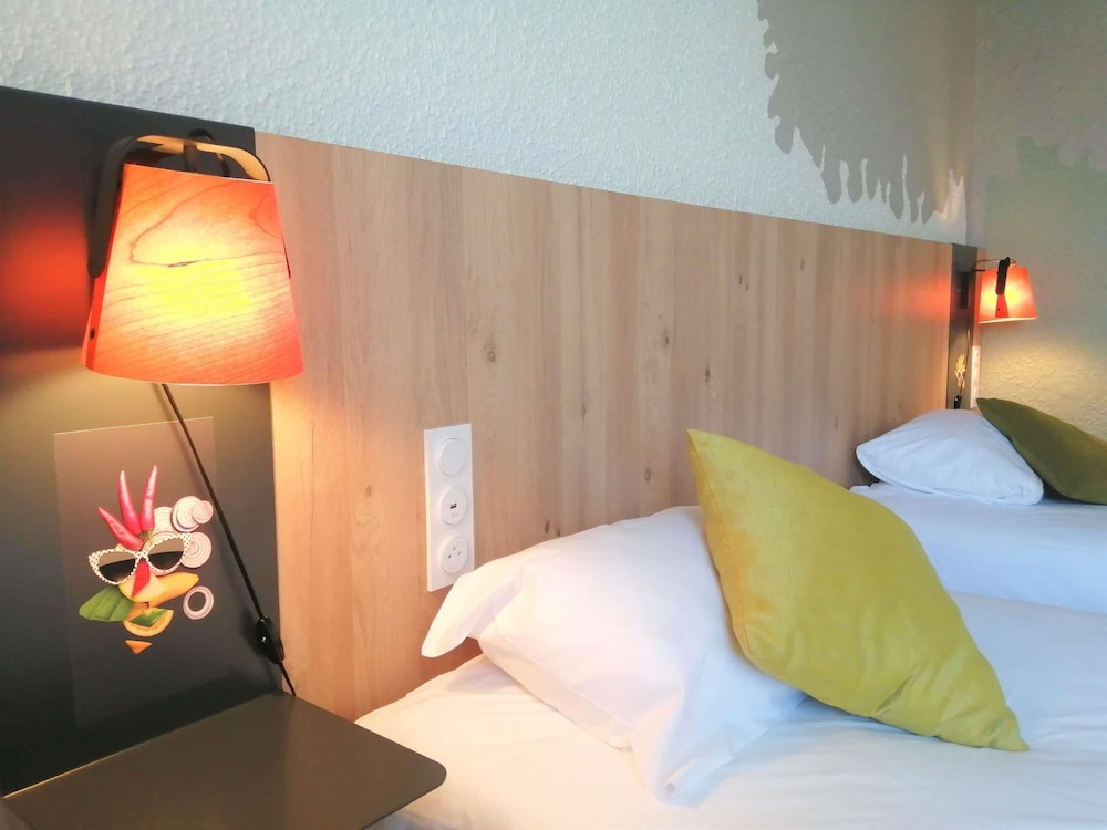 Habitación estándar con 2 camas individuales del hotel Ibis Styles Tours Sud. Foto 9