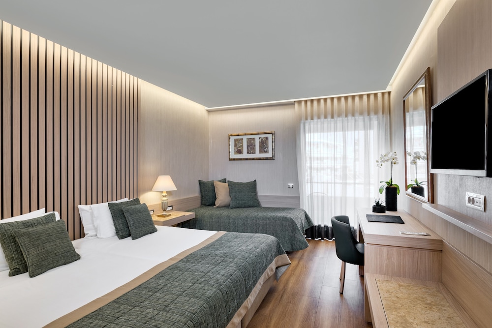 Habitación triple ejecutiva del hotel Divani Palace Acropolis