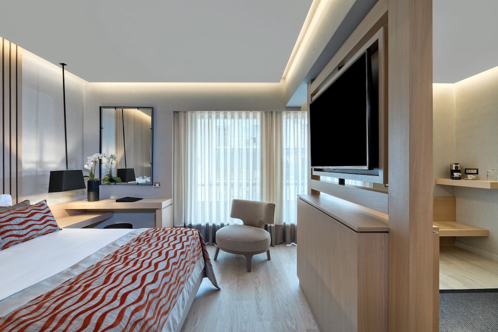 Suite Familiar del hotel Divani Palace Acropolis. Foto 1