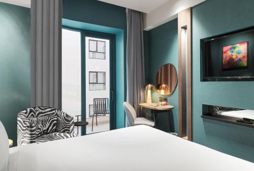 Habitación Superior Down to Earth del hotel NYX Esperia Palace Hotel Athens by Leonardo Hotels. Foto 5