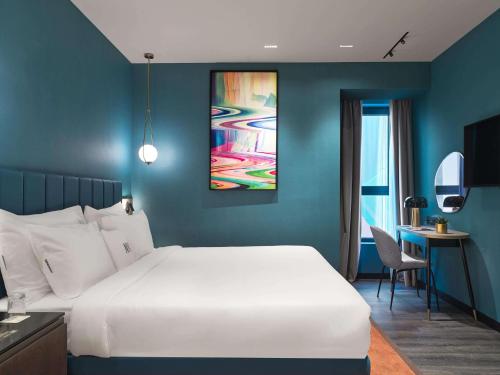 Habitación Familiar - 2 habitaciones comunicadas del hotel NYX Esperia Palace Hotel Athens by Leonardo Hotels. Foto 5
