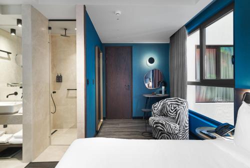 Habitación Individual Design Star del hotel NYX Esperia Palace Hotel Athens by Leonardo Hotels. Foto 1