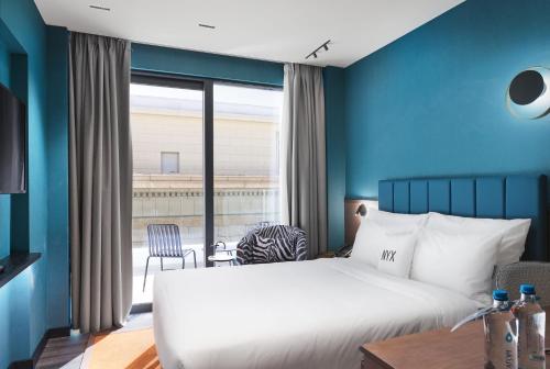 Habitación Individual de diseño con vistas a Licabeto del hotel NYX Esperia Palace Hotel Athens by Leonardo Hotels. Foto 1