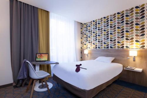 Habitación Estándar con 1 cama doble del hotel Ibis Styles Chaumont Centre Gare. Foto 12