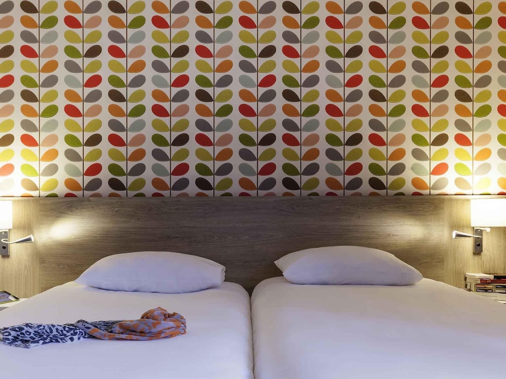 Habitación estándar con dos camas individuales del hotel Ibis Styles Chaumont Centre Gare. Foto 1