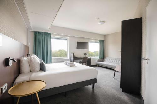 Habitación Confort del hotel Flonk Hotel Groningen Zuid, BW Signature Collection. Foto 1