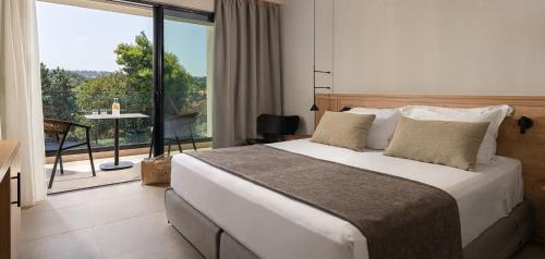 Habitación Deluxe del hotel Helea Lifestyle Beach Resort. Foto 1