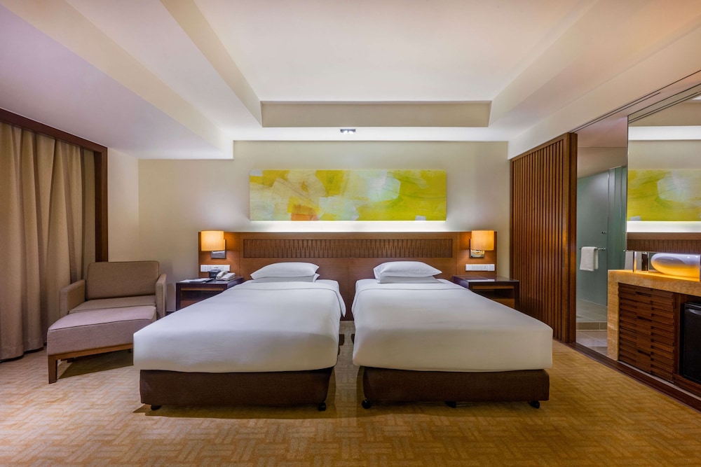 2 camas individuales del hotel Hyatt Regency Kinabalu