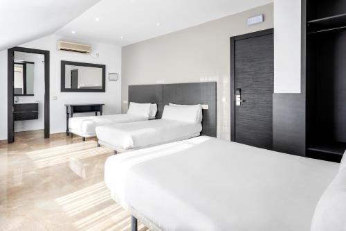 Habitación Cuádruple del hotel Victoria