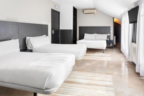 Habitación Cuádruple del hotel Victoria. Foto 4