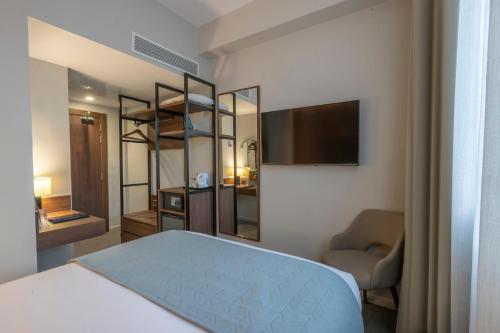 Estándar Deluxe con cama grande del hotel Riu Plaza The Gresham Dublin. Foto 2