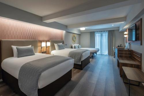 Habitación Deluxe Familiar - 2 camas individuales del hotel Riu Plaza The Gresham Dublin. Foto 4