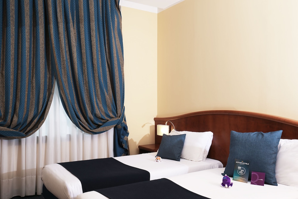 Habitación Standard con 2 camas individuales del hotel Mercure Genova San Biagio. Foto 2