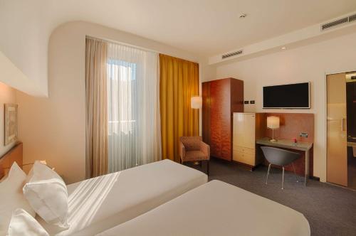 Habitación Doble Estándar - 1 o 2 camas del hotel Nh Bergamo. Foto 1