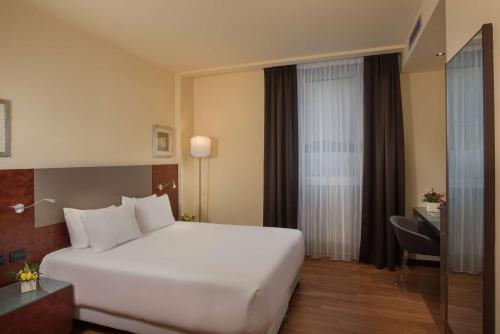 Habitación Doble Superior - 1 o 2 camas del hotel Nh Bergamo. Foto 1