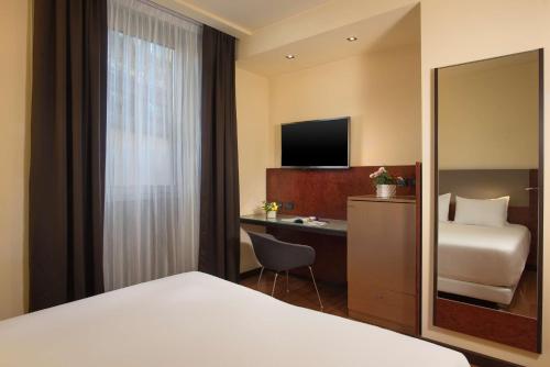 Habitación Doble Superior - 1 o 2 camas del hotel Nh Bergamo. Foto 2