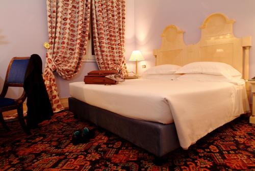 Habitación Doble del hotel Albani Firenze. Foto 7
