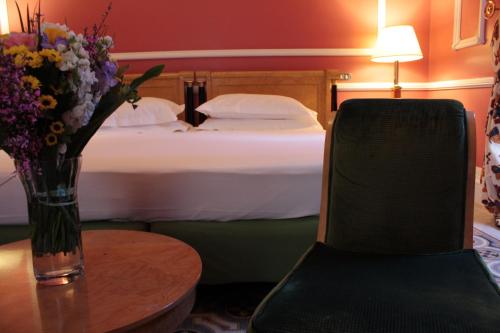 Habitación Familiar del hotel Albani Firenze. Foto 9