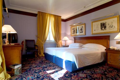 Habitación Triple del hotel Albani Firenze. Foto 2
