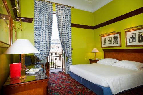 Habitación Doble Superior con terraza del hotel Albani Firenze. Foto 1