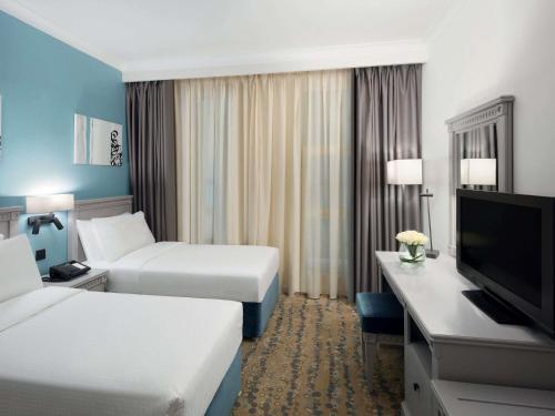 Classic Comfort Twin Room with Tower View del hotel Anwar Al Madinah Movenpick