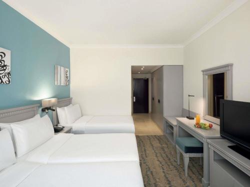 Classic Comfort Triple Room with Tower View del hotel Anwar Al Madinah Movenpick. Foto 2