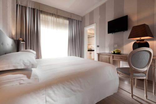 Habitación Comfy con vistas a la ciudad del hotel C-hotels Ambasciatori. Foto 1