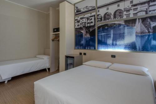 Habitación Triple del hotel ByB Firenze Nuovo Palazzo Di Giustizia