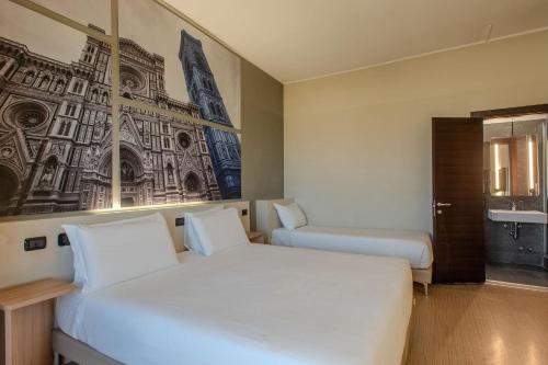 Habitación Cuádruple del hotel ByB Firenze Nuovo Palazzo Di Giustizia. Foto 1
