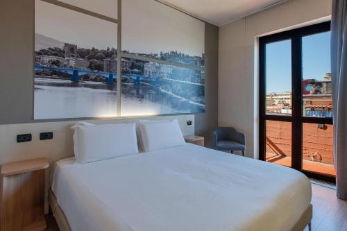Habitación Doble adaptada para personas con movilidad reducida del hotel ByB Firenze Nuovo Palazzo Di Giustizia. Foto 1