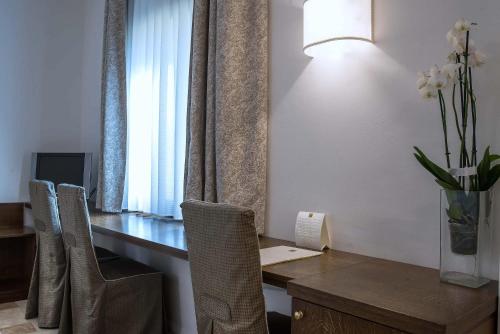 Habitación Cuádruple del hotel Machiavelli Palace