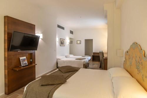 Habitación Cuádruple del hotel Machiavelli Palace. Foto 2