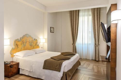 Habitación Cuádruple del hotel Machiavelli Palace. Foto 3
