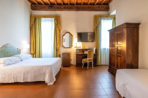 Habitación Triple del hotel Machiavelli Palace