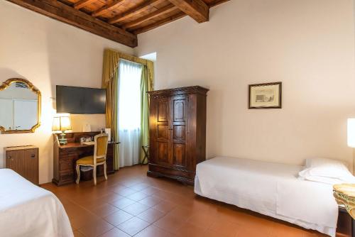 Habitación Triple del hotel Machiavelli Palace. Foto 1