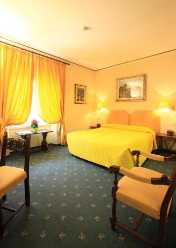 Habitación Doble Clásica del hotel San Giorgio And Olimpic. Foto 6