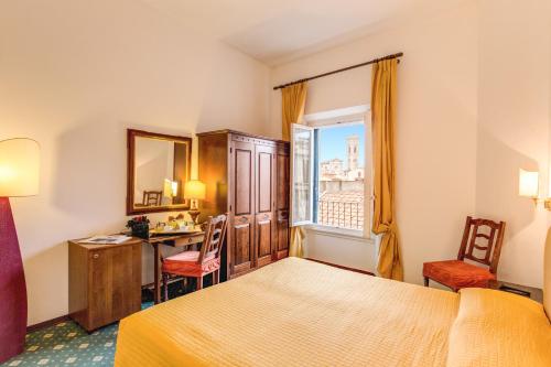 Habitación Doble Clásica del hotel San Giorgio And Olimpic. Foto 11