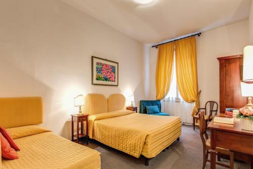 Habitación Triple del hotel San Giorgio And Olimpic. Foto 1