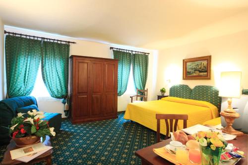 Habitación cuádruple del hotel San Giorgio And Olimpic
