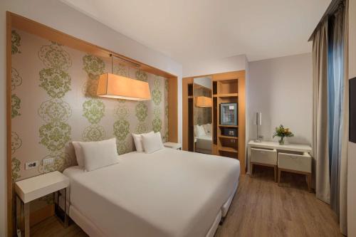 Habitación Doble Estándar - 1 o 2 camas del hotel Nh Genova Centro. Foto 1